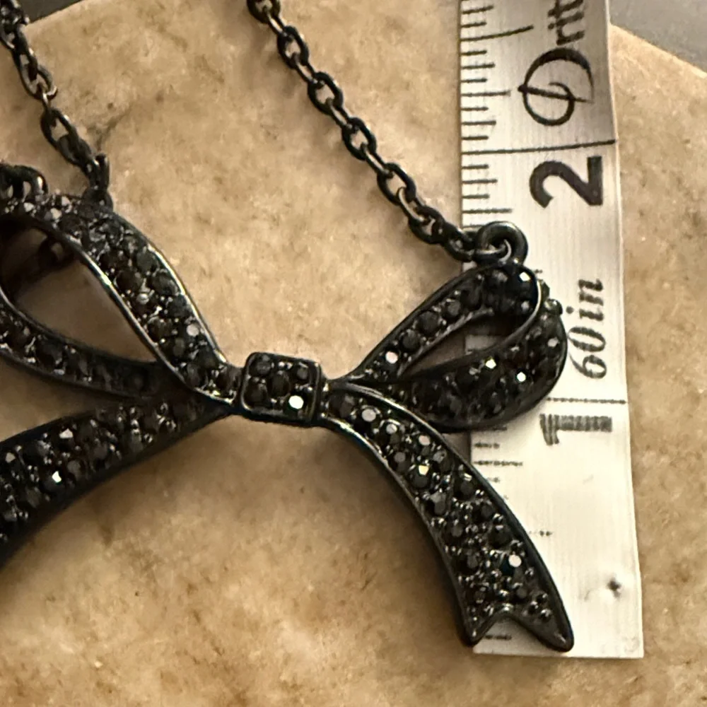 Gunmetal hematite-toned necklace a Bow Statement Vintage pendant &BLK Rhinestone